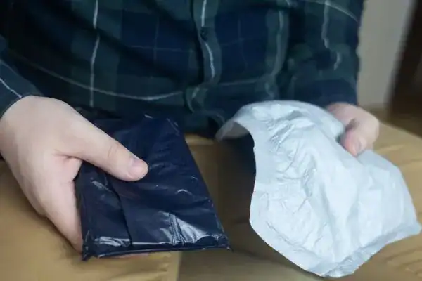 image of man holding stool incontinence Northampton products